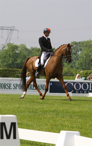 Alex Hua Tian from China on Don Geniro, leaders in the CCI3* at Tattersalls after the dressage. © Tattersalls International Horse Trials
