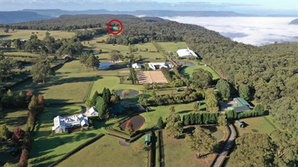 An aerial photo of Wallaby Hill, with the position of the new equipment shed at the back of the property marked in red. © Wallaby Hill
