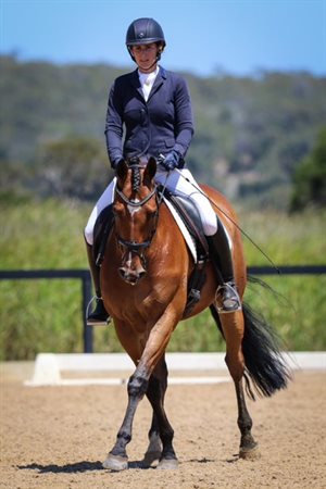Another Option (racing name King Zetoire) and Lucy Kolomanski lead the Novice Championship. © Michelle Terlato