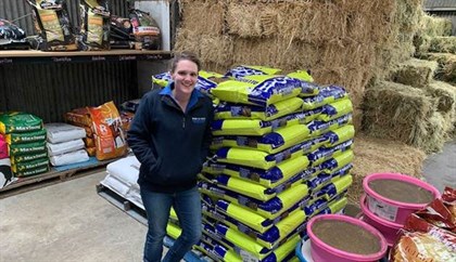 Asha Shanahan, co-owner of Crossroads Trading in Ballan, with a pellet of Allrounder horse feed © Image supplied to Racing.com