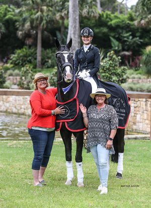 Bay Coast Roofing Grand Prix under 25 Freestyle winner Jessica Dertell & Zanzibar 69.040% pictured with Mum Kate Dertell & Zanzibar's owner Sam Thoma