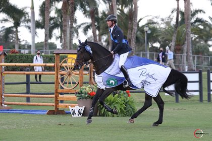 Ben Maher and Tic Tac in their victory gallop after winning the $137,000 Restylane Grand Prix CSI3*. © Sportfot