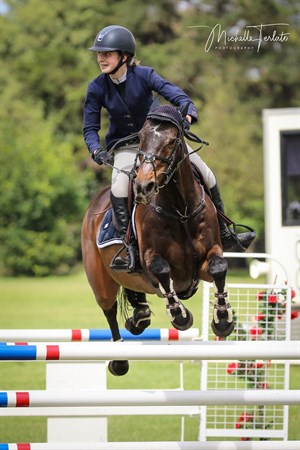 Charlee Dobbin on the way to winning the 105cm Junior on Dreamtime Invader. © Michelle Terlato Photography