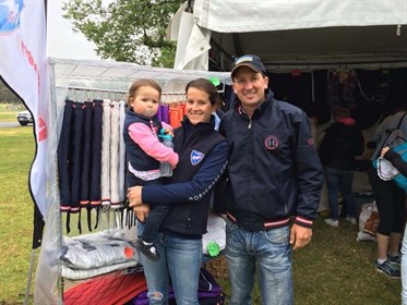 Family Shot  of the Tainshs manning their stand