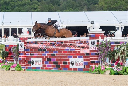Holly smith and Quality Old Joker clearing the 2.20m Puissance © Equerry Bolesworth International Horse Show Facebook page