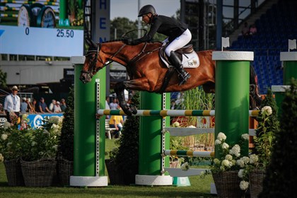 Ingrid Klimke and SAP Hale Bob OLD had one rail down but retained first place.