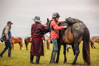 Judith Jaeckle getting ready to ride - credit Kathy Gabriel