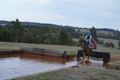 Kate and Sweeney tackle the water confidently, Kate comfortable using emergency rein contact © Chloe Chadwick