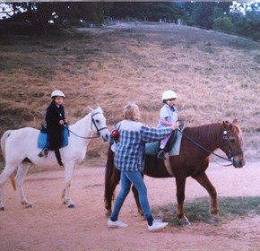Little 5-year-old Rikki on Red © Sue Billson-Hewett