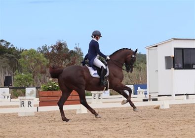 Mary Nitschke and Utopian Cardinal soaring in the extended canter in the Grand Prix. © Bernadette Buchanan