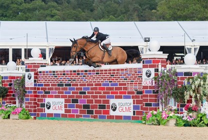 Michael Pender and Belgian Warmblood, Hearton Du Bois Halleux clearing the 2.20m Puissance © Equerry Bolesworth International Horse Show Facebook page