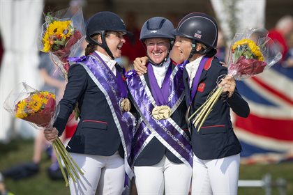 Team GB celebrates victory during the prize giving ceremony. ( L to R) Piggy March, Nicola Wilson and Sarah Bullimore. © FEI/Richard Juilliart