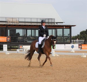 Skye Wright riding her way to first place in the Elementary Freestyle on Kamber Merfyn. © Fern Wright