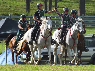 Sue Sutcliffe and Brook Sample follow 11-year old juniors, Noah Hoogland and Zac Sample. © Bob Sample