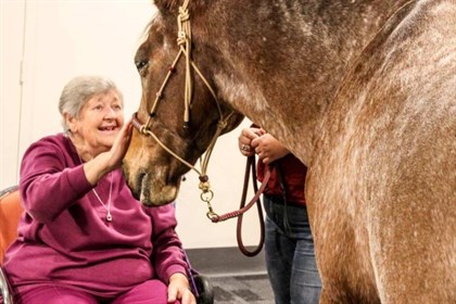 This resident enjoyed her one-on-one time with Bushman the therapy horse © Sarah Moss
