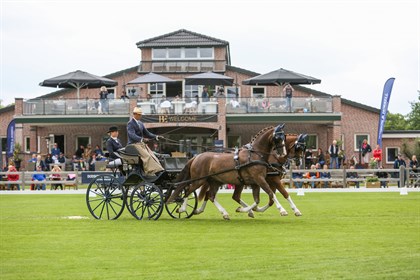 Tor Van Den Berge and his team in the dressage at DVI © Amy Mundell